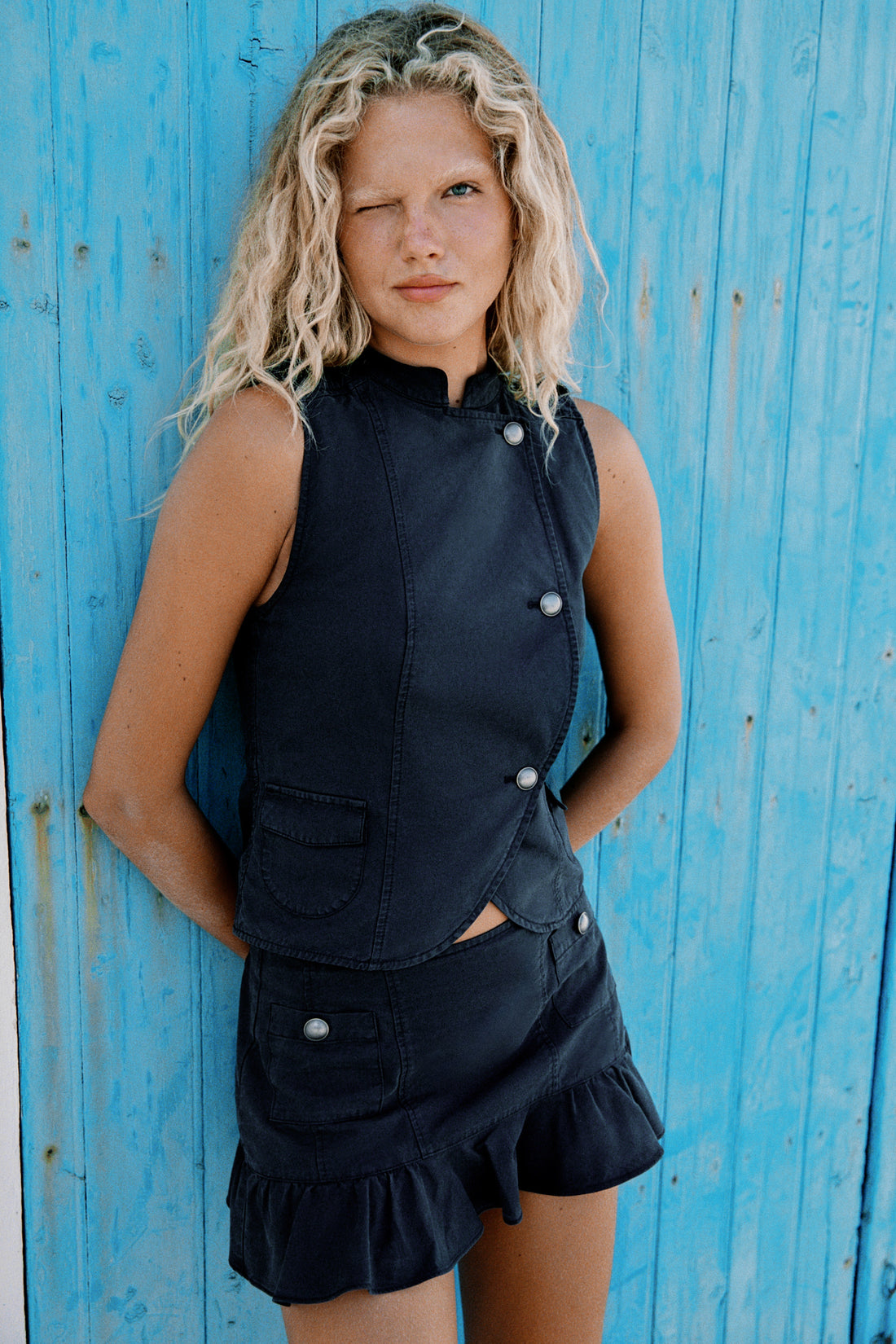 TOP GILET À PATTES ET BOUTONS