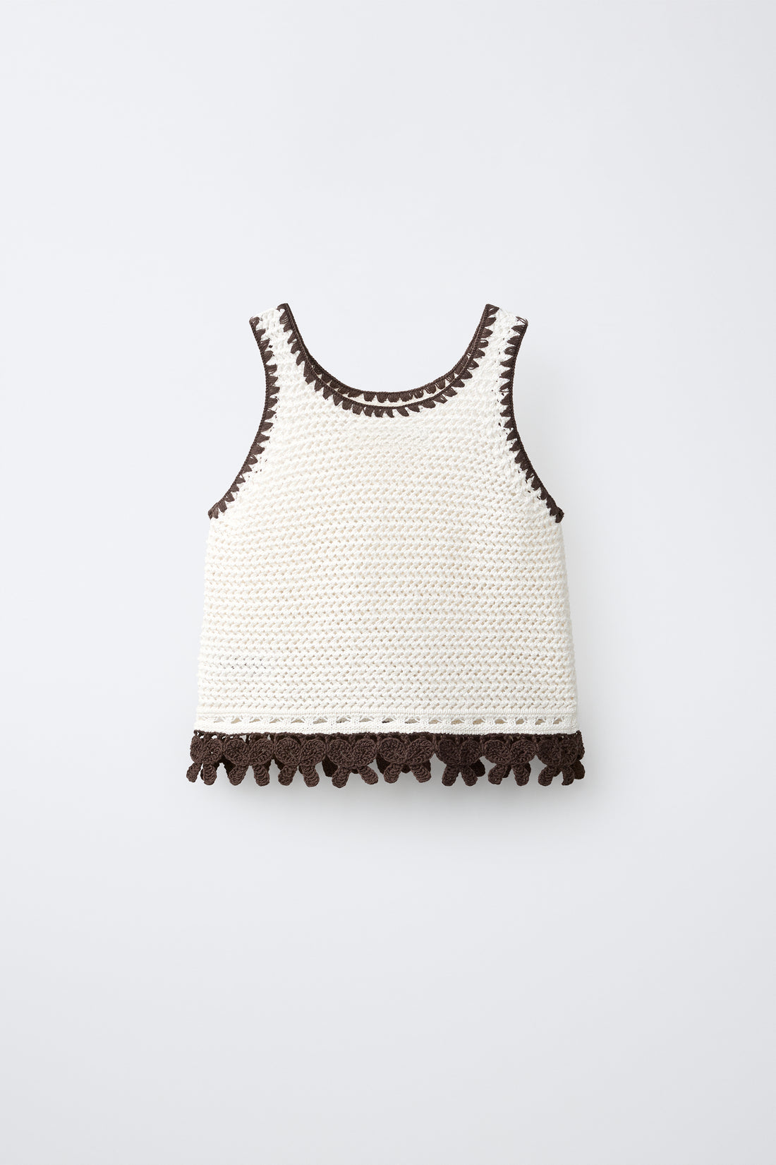 TOP EN MAILLE AVEC NŒUDS EN CONTRASTE