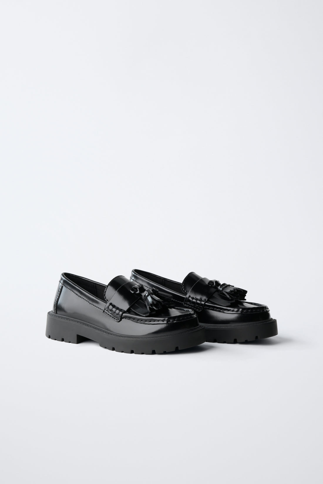 MOCASSINS À POMPONS
